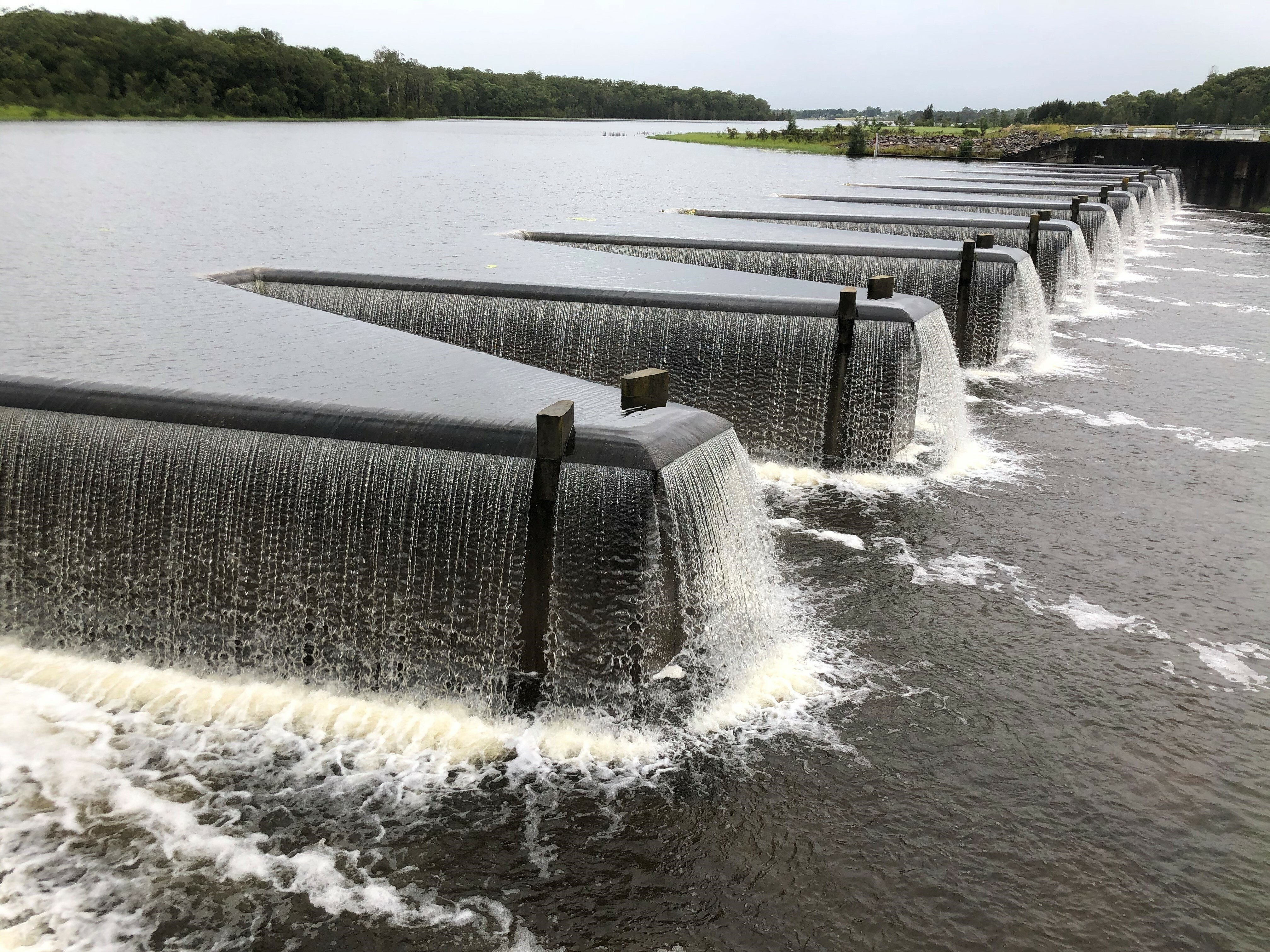 Grahamstown Dam spill way overflowing with water